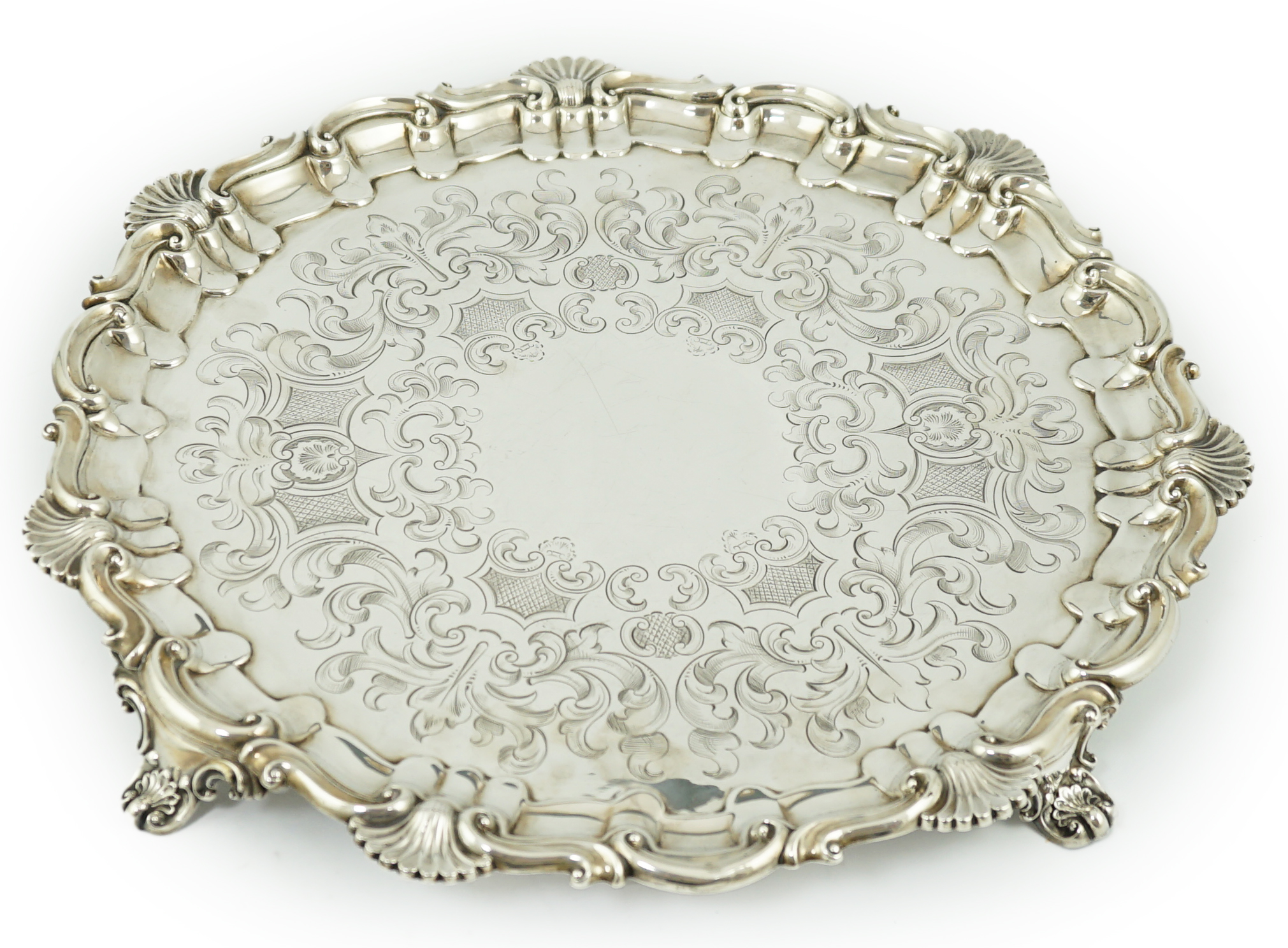 A large Victorian engraved silver salver, by Henry Wilkinson & Co